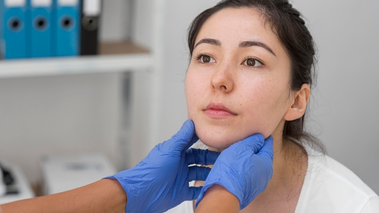 Client receiving non-surgical jawline contouring treatment at Deva Med Spa in Vancouver